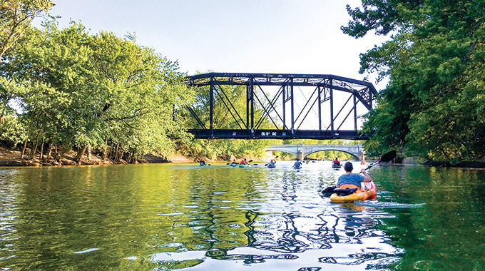 Kayakers paddle St. Marys River in Fort Wayne. | Photo courtesy Visit Fort Wayne/Stephen Bailey