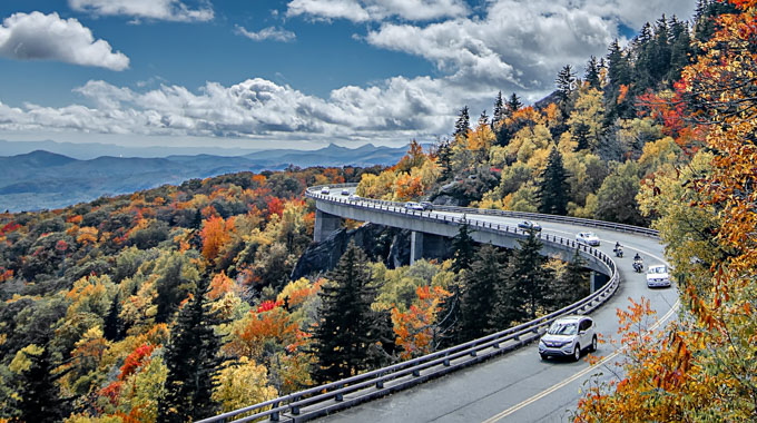 Cars winding down Blue Ridge Parkway through Great Smoky Mountains National Park