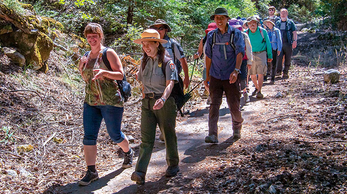 Ranger Yenyen Chan leads hikers on a Yosemite trail. | Photo by Eric Paul Zamora