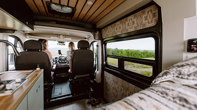 Driving a campervan may take some practice, but the learning curve—and the wheelbase—is not as long as an RV’s. | Photo by Sara Bill Photography for Walden Campervans