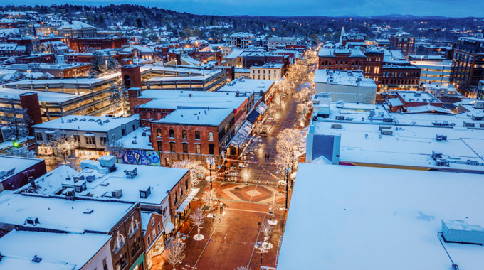 Lights illuminate snowy Church Street Marketplace in Burlington, Vermont