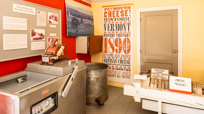 A display detailing the history of Plymouth Artisan Cheese