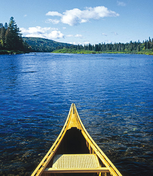 A canoe on the 92-mile Allagash Wilderness Waterway. | Photo by KC Shields/Alamy Stock Photo