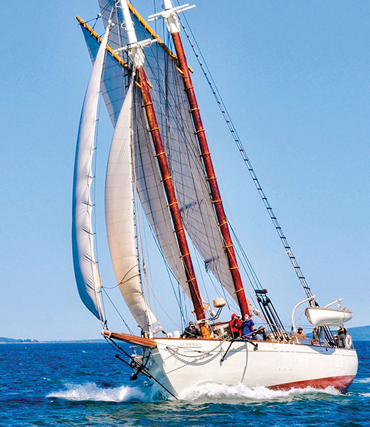 The Ladona, one of eight members of the Maine Windjammer Association, is known for its comfort and sumptuous meals that include cooked-to-order full breakfasts. | Photo by Tom Nangle