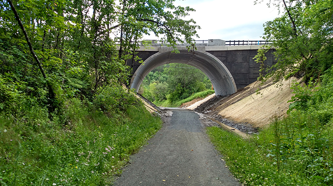 This underpass along the Lamoille Valley Rail Trail isn’t far from the trailhead. Also nearby, the vibrant town of St. Johnsbury has Vermont’s only public planetarium and an arts center that screens indie films. | Photo courtesy Lamoille Rail Trail Valley