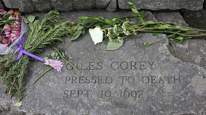 A granite stone honors a victim of the Salem witch trials. | Photo courtesy Destination Salem