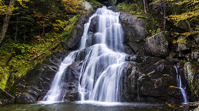 On the way north to Warren along Vermont Route 100, Moss Glen Falls is a popular subject for painters. | Photo by Mark/stock.adobe.com