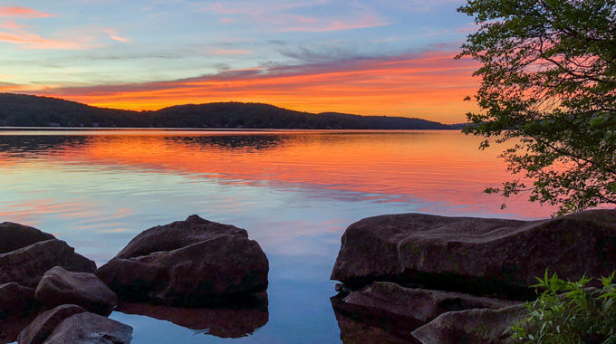 A colorful sunset at Spectacle Pond.