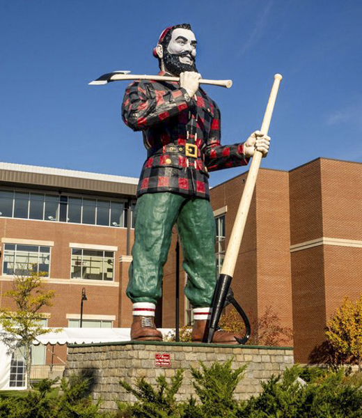 With this Paul Bunyan statue, Bangor, Maine, honors its past logging glories. | Photo by Brian Logan/Alamy Stock Photo