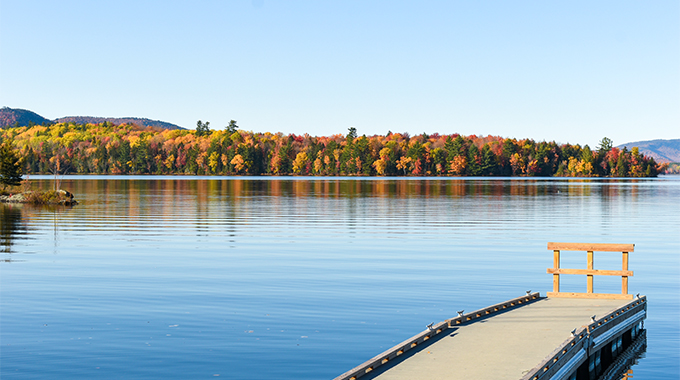 Lake Umbagog, the centerpiece of the Umbagog National Wildlife Refuge, stretches some 7 miles in length with an average depth of only 15 feet. | Photo by ISAIYARASAN/stock.adobe.com