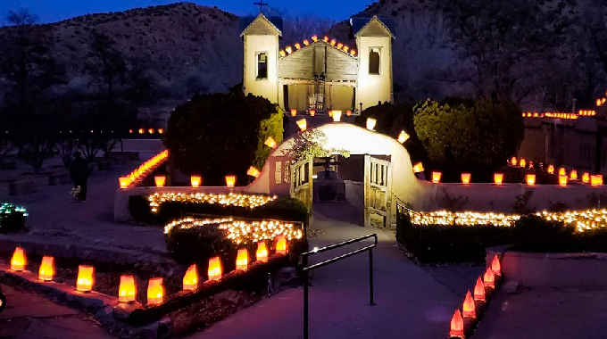 Sacred display of farolitos at Santuario de Chimayó. | Photo courtesy Julio Gonzalez/Santuario de Chimayó