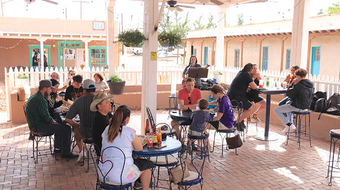 Guests enjoy entertainment on the patio at Don Felix Café.