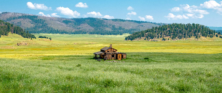 A building in an open field A building in an open field