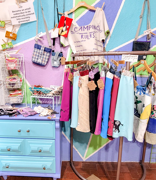 A rack of clothing inside Sew Minimal