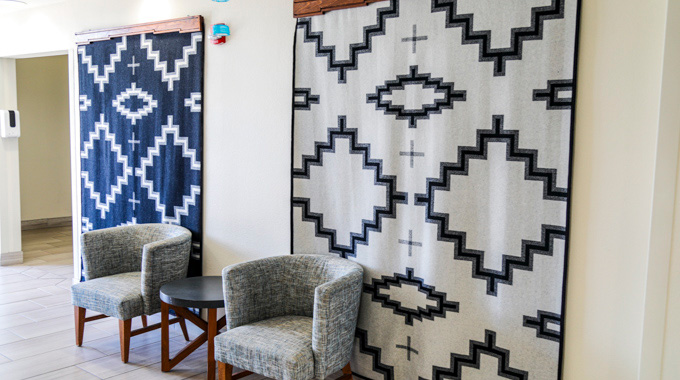 Tapestries hanging on the walls of the Holiday Inn Express & Suites in Albuquerque.