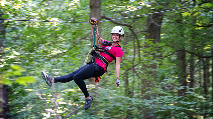 Woman zip lining in Shawnee National Forest.