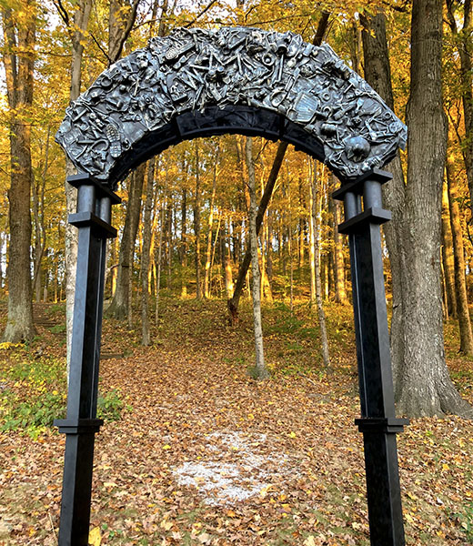 Jack Gron’s “Sculpture Trails Gateway” is one of dozens of artworks that visitors encounter on 3 miles of forest trails. | Photo by Hugh Patton/Sculpture Trails Outdoor Museum
