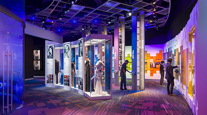 Visitors browsing exhibits inside theGrammy Museum Mississippi