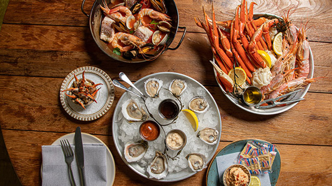 In Bay St. Louis, Thorny Oyster in the Pearl Hotel serves up creative seafood dishes and raw bar specialties. | Photo by Randy Schmidt