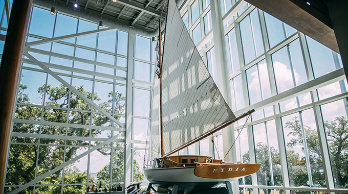 Exhibits at the Maritime & Seafood Industry Museum include wooden boats, fishing equipment, and the lens from the Ship Island lighthouse. | Photo courtesy Coastal Mississippi