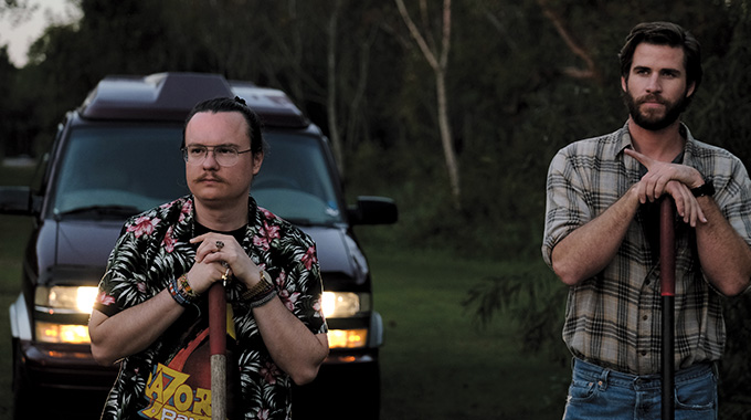 Arkansas native Clark Duke, left, directed and acted in Arkansas, a crime thriller with a star-studded cast, including Liam Hemsworth (right). | Photo courtesy Lionsgate