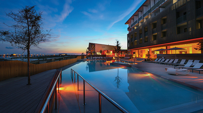 The Lodge at Gulf State Park’s inviting pool at night. | Photo courtesy The Lodge at Gulf State Park