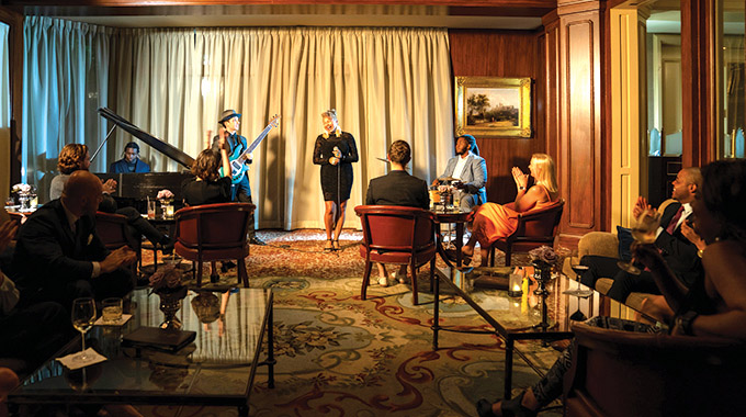 Guests enjoy live entertainment in the Windsor Court Hotel’s Polo Club Lounge. | Photo courtesy Windsor Court Hotel