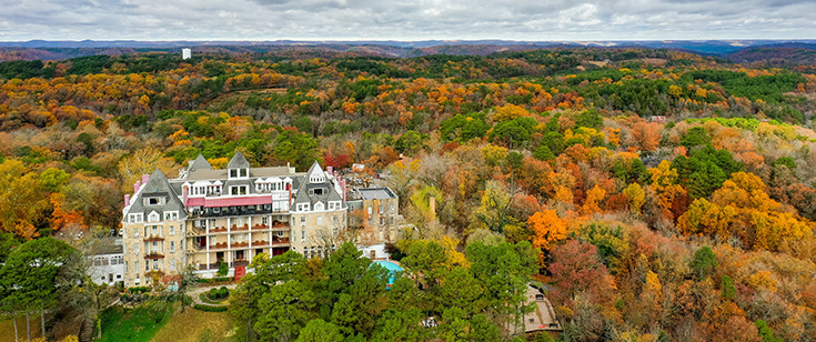 Aerial view of the Crescent Hotel and surrounding forest. Aerial view of the Crescent Hotel and surrounding forest.
