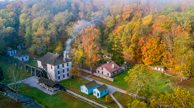 An aerial view of historic buildings at Spring Mill State Park.