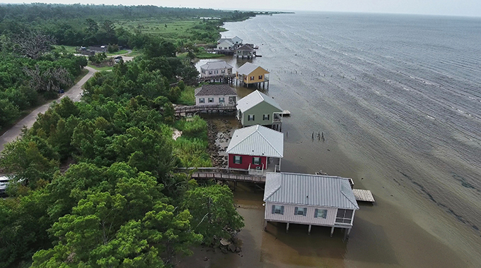 Guests at Fontainebleau State Park in Mandeville, Louisiana, can settle into cabins that sit atop stilts in Lake Pontchartrain. | Photo by PJ Hahn Photography/pjhahnphotography.com