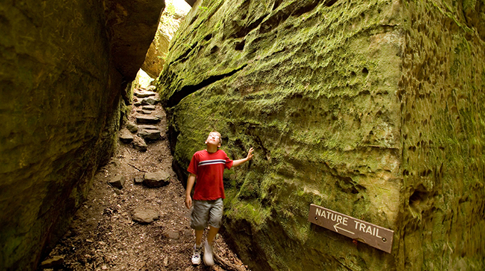 Visitors will marvel at the hiking trails in Giant City State Park in Makanda, Illinois, that showcase massive sandstone bluffs. | Photo by Jason Lindsey / Alamy Stock Photo