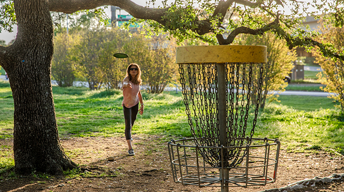 Throw an ace at Zilker Metropolitan Park's disc golf course. | Photo by Kenny Braun