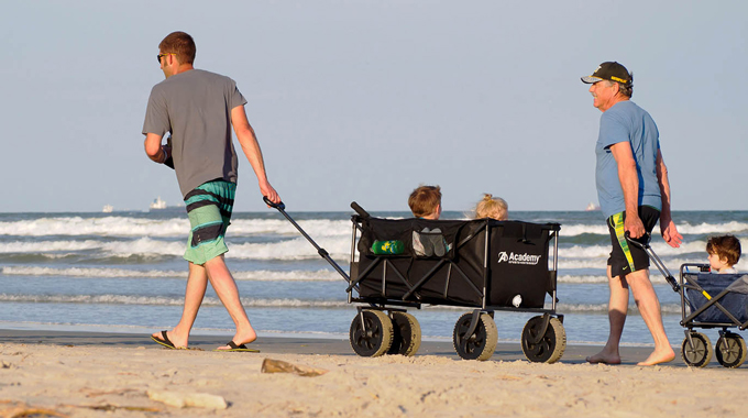 Families play on the beach at Port Aransas. | Alamy Stock Photo