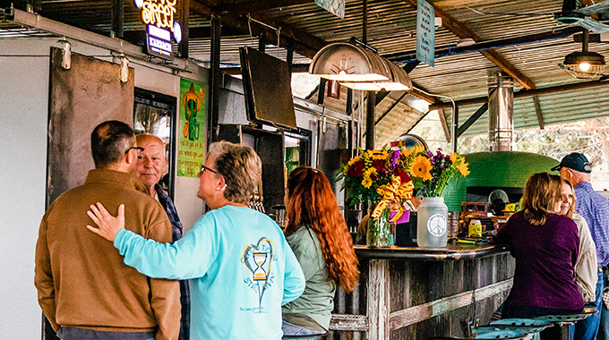 Enjoy pizza and a refreshing glass of beer at the Hippies, Gypsies and Hops in Concan. | Photo courtesy Visit Uvalde County