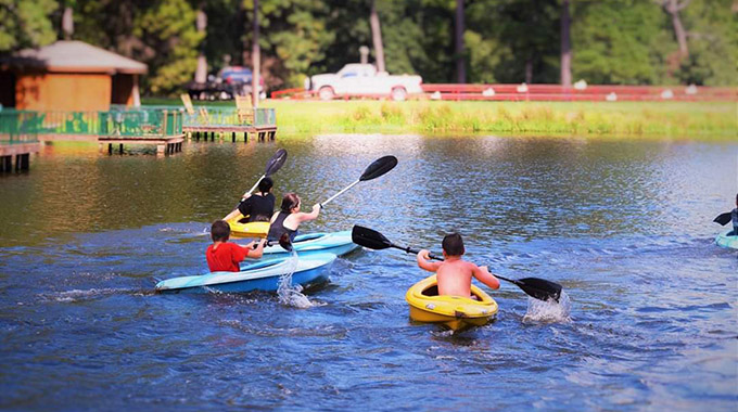 Kayakers at the Deer Lake Cabins Ranch Resort. | Photo by Deer Lake Cabins Ranch Resort