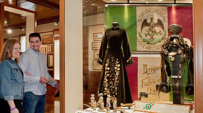 Hillary and Kevin Butterfield of Grand Rapids, Michigan, view a display at the Bryan Museum. |