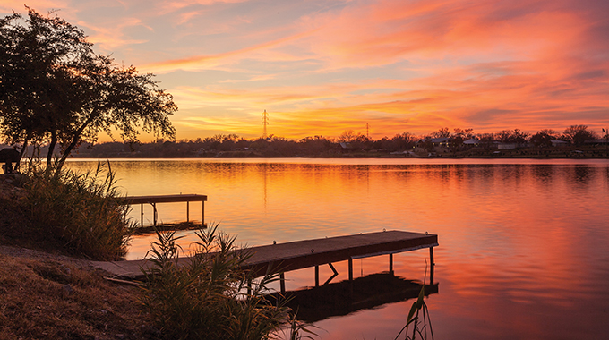 The calm waters at Lake Marble Falls, a reservoir on the Colorado River in the Texas Hill Country, are ideal for stand-up paddleboarding.  | Photo by Laurence Parent