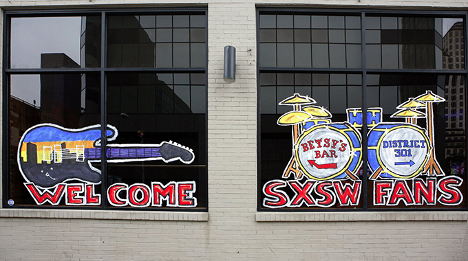 A window painting along Sixth Street during the annual SXSW festival in Austin. | Photo by Galinast/Alamy Stock Photo