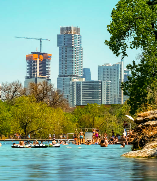 People enjoying the water at Barton Springs Pool