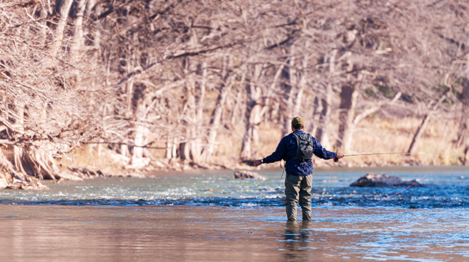 Man fly-fishing in the water