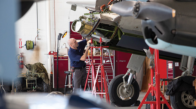 Aviation experts meticulously bring planes back to life in the museum’s hangar workshop, the Fighter Factory.