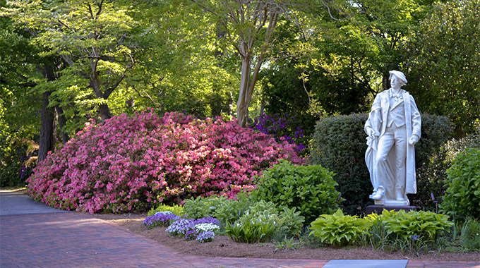The Norfolk Botanical Garden's Moses Ezekiel collection features 11 7-foot-tall statues of famous artists, including American sculptor Thomas Crawford. | Photo by Norfolk Botanical Garden