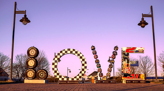 A LOVEwork sculpture made from Goodyear tires, checkered flag vinyl, racing helmets, and sheet metal that was once part of NASCAR race cars. | Photo courtesy Virginia Tourism Corporation