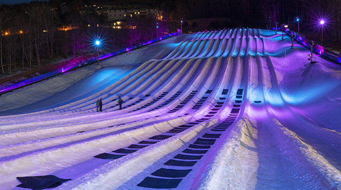 Massanutten Resort offers a new twist on classic winter activities, with music and a neon-lit tubing course. | Photo by Sarah Hauser/courtesy Virginia Tourism Corporation