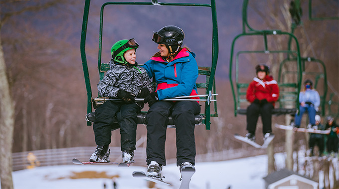 Guests ski lift to the top of Wintergreen resort, where they can enjoy skiing, snowboarding, and snow tubing. | Photo by Sam Dean/courtesy Virginia Tourism Corporation