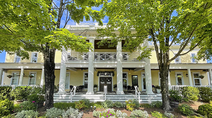 The porch and balcony at the Henry Clay Inn provide guests a trackside view. | Photo by BigTree