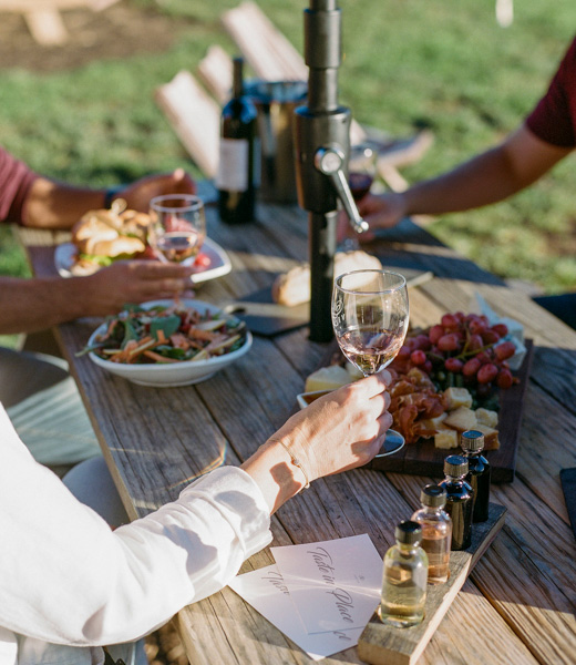 At Veritas Vineyards, you can go at your own pace with “Taste in Place,” a self-guided virtual tasting that details the 4 mini bottles in your flight. | Photo by Abby Grace Photography