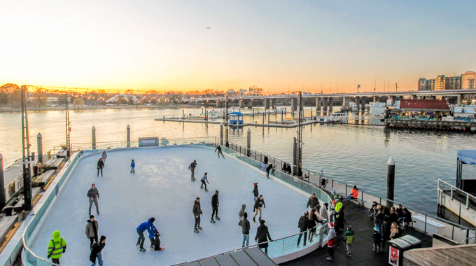 Skaters on the The Wharf ice rink.