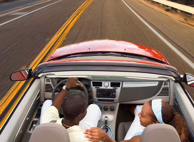 Couple taking selfie on the side of the road Couple taking selfie on the side of the road