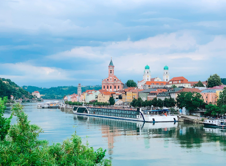 AmaWaterways ship cruising on a river AmaWaterways ship cruising on a river